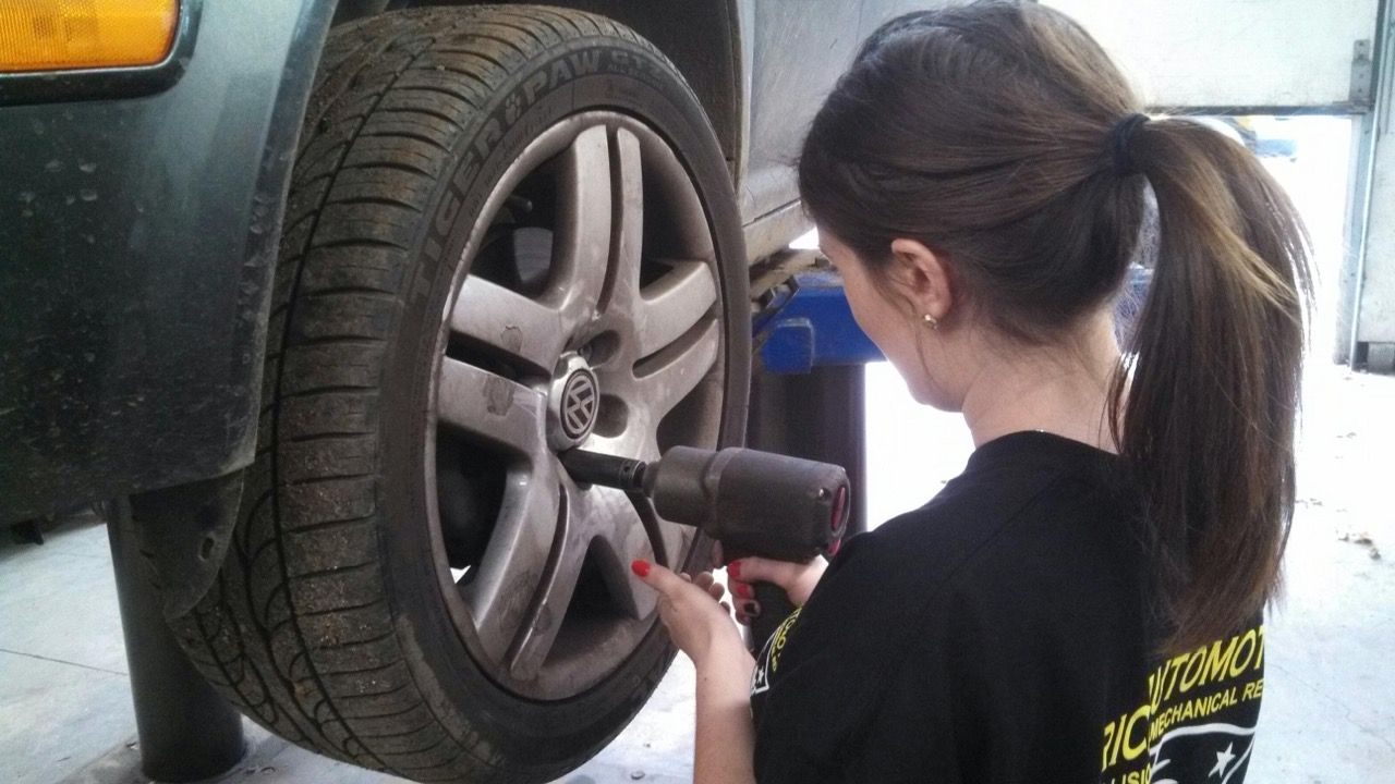 Technician working on wheel